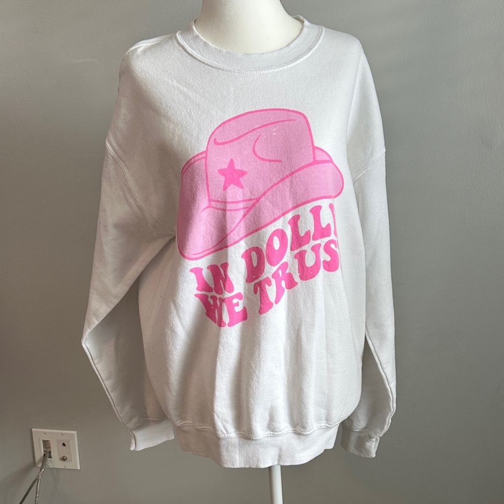 In Dolly We Trust White Sweater with Pink Hat Graphic